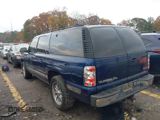 2001 GMC Yukon XL SLE with VIN 3GKFK16T41G138430, listed as a IAAI auction lot 40949808 with 263,256 mi miles. Bid and sale history available at carsss.com. Image 3.