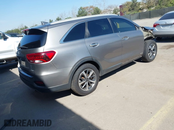 2019 Kia Sorento EX with VIN 5XYPHDA50KG514825, listed as a IAAI auction lot 41612310 with 100,855 mi miles and . Bid and sale history available at DreamBid. Image 4.