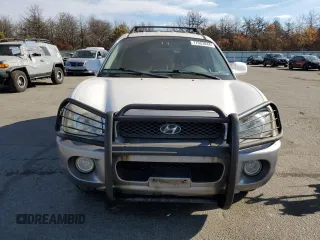2002 Hyundai Santa Fe GLS with VIN KM8SC13D42U162953, listed as a Copart auction lot 77953044 with 98,463 mi miles and Clean Title. Bid and sale history available at carsss.com. Image 5.
