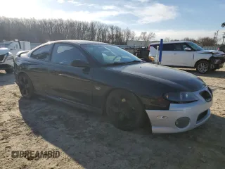 2004 Pontiac GTO z VIN 6G2VX12G74L249425, wystawiony jako Copart lot #48103235 z przebiegiem 106 334 mil mil oraz Szkoda całkowita • Salvage title. Historia ofert i sprzedaży dostępna na DreamBid. Obrazek 4.