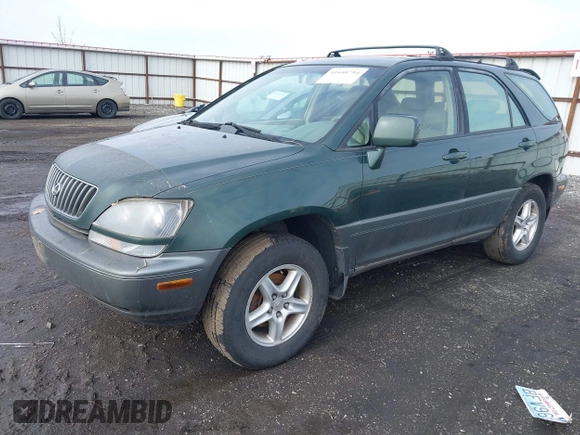 1999 Lexus RX 300 Luxury SUV with VIN JT6HF10U9X0026530, listed as a IAAI auction lot 41640794 with 256,498 mi miles. Bid and sale history available at carsss.com. Image 2.