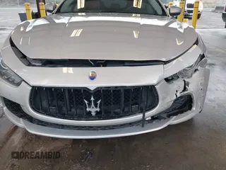 2017 Maserati Ghibli with VIN ZAM57XSLXH1238134, listed as a IAAI auction lot 41871754 with 34,776 mi miles. Bid and sale history available at carsss.com. Image 6.