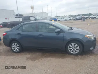 2015 Toyota Corolla L z VIN 2T1BURHE3FC323510, wystawiony jako IAAI lot #42040468 z przebiegiem 94 089 mil mil oraz . Historia ofert i sprzedaży dostępna na DreamBid. Obrazek 13.