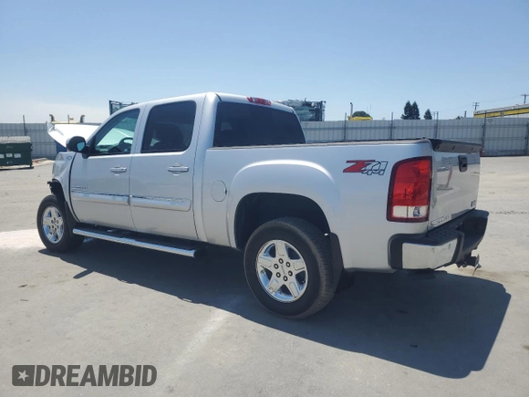 2013 GMC Sierra 1500 SLT with VIN 3GTP2WE71DG157541, listed as a Copart auction lot 62363665 with 56,143 mi miles and Salvage title. Bid and sale history available at DreamBid. Image 2.