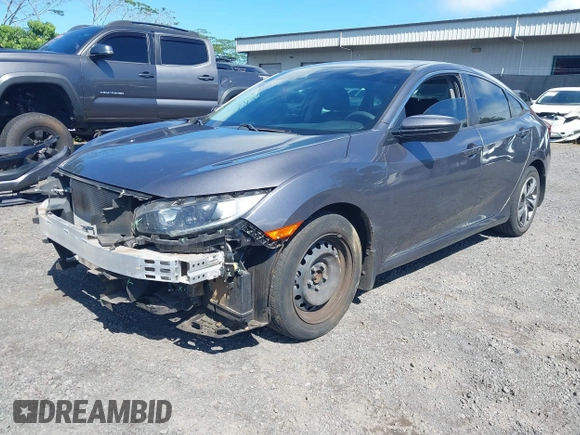 2020 Honda Civic LX z VIN 19XFC2F67LE001375, wystawiony jako IAAI lot #42033879 z przebiegiem 79 941 mil mil oraz . Historia ofert i sprzedaży dostępna na DreamBid. Obrazek 2.