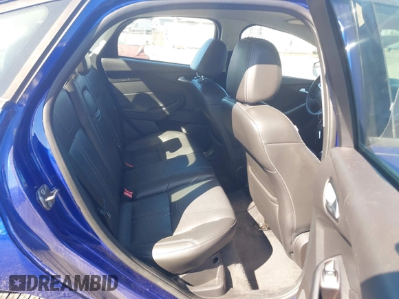 2013 Ford Focus SE z VIN 1FADP3F28DL178210, wystawiony jako IAAI lot #42199073 z przebiegiem 110 542 mil mil oraz . Historia ofert i sprzedaży dostępna na DreamBid. Obrazek 8.