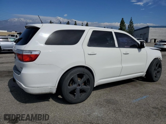 2013 Dodge Durango R/T with VIN 1C4SDHCT2DC559006, listed as a Copart auction lot 49275695 with 117,323 mi miles and Salvage title. Bid and sale history available at DreamBid. Image 3.