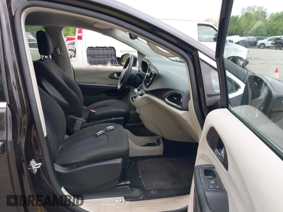 2017 Chrysler Pacifica Touring with VIN 2C4RC1DG9HR620973, listed as a IAAI auction lot 42250448 with 108,863 mi miles and . Bid and sale history available at DreamBid. Image 5.