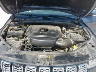 2021 Jeep Grand Cherokee Summit with VIN 1C4RJEJG2MC657402, listed as a Copart auction lot 59098465 with 61,442 mi miles and Salvage title. Bid and sale history available at DreamBid. Image 12.