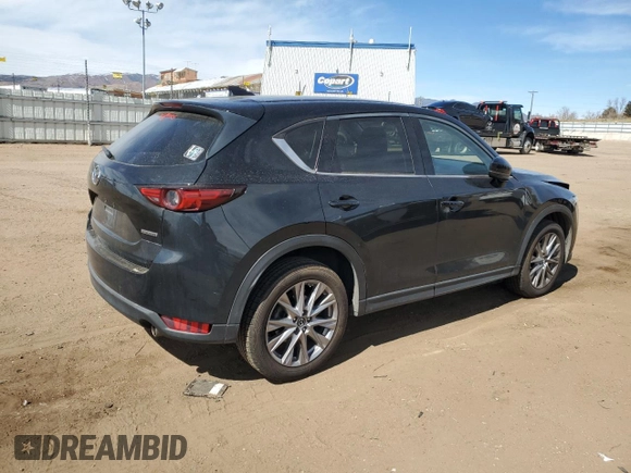 2020 Mazda CX-5 Grand Touring with VIN JM3KFBDMXL1735154, listed as a Copart auction lot 49313585 with 82,750 mi miles and Salvage Title. Bid and sale history available at DreamBid. Image 3.