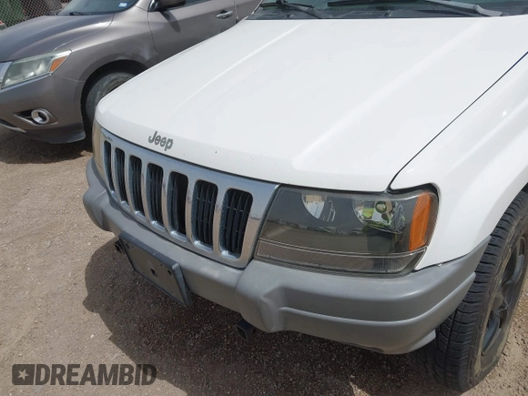 2002 Jeep Grand Cherokee with VIN 1J8GW38S62C219396, listed as a IAAI auction lot 41831930 with 196,167 mi miles and . Bid and sale history available at DreamBid. Image 6.