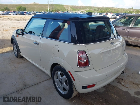 2011 MINI Hardtop with VIN WMWSU3C5XBT095591, listed as a IAAI auction lot 42366393 with 99,092 mi miles and . Bid and sale history available at DreamBid. Image 3.