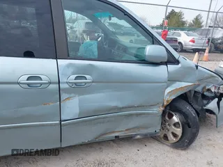 2004 Honda Odyssey EX-RES z VIN 5FNRL18864B093614, wystawiony jako IAAI lot #41674733 z przebiegiem 237 552 mil mil oraz . Historia ofert i sprzedaży dostępna na DreamBid. Obrazek 14.