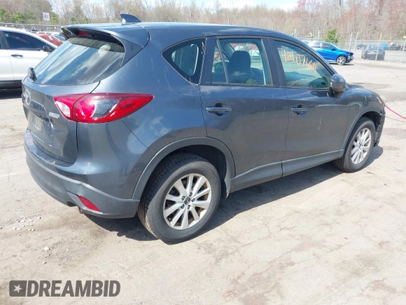 2013 Mazda CX-5 Sport with VIN JM3KE4BE7D0164398, listed as a IAAI auction lot 42107164 with 166,852 mi miles. Bid and sale history available at carsss.com. Image 4.
