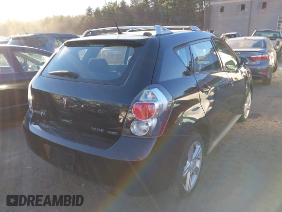 2009 Pontiac Vibe with VIN 5Y2SM67059Z417404, listed as a IAAI auction lot 40857104 with 172,676 mi miles. Bid and sale history available at carsss.com. Image 4.