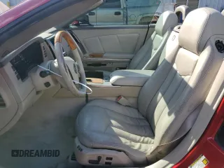 2005 Cadillac XLR z VIN 1G6YV34A555600826, wystawiony jako Copart lot #79404394 z przebiegiem 94 892 mil mil oraz Szkody całkowita. Historia ofert i sprzedaży dostępna na DreamBid. Obrazek 7.