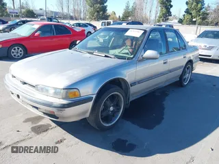 1991 Honda Accord LX with VIN JHMCB7652MC035838, listed as a IAAI auction lot 41329502 with 176,816 mi miles. Bid and sale history available at carsss.com. Image 2.
