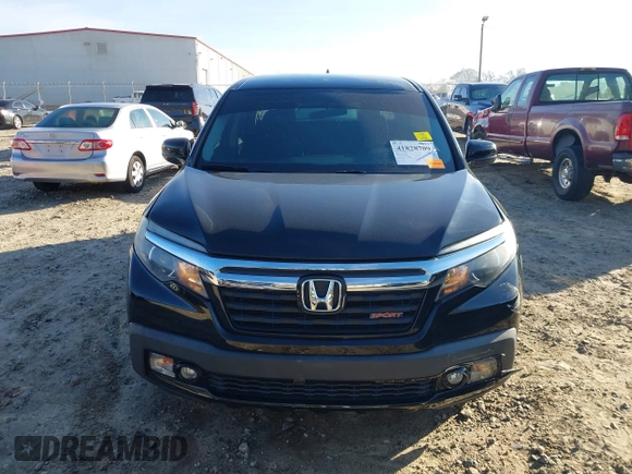 2019 Honda Ridgeline Sport with VIN 5FPYK2F12KB007990, listed as a IAAI auction lot 41828709 with 67,736 mi miles and . Bid and sale history available at DreamBid. Image 12.