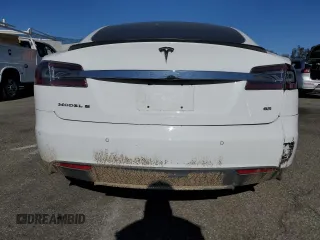 2014 Tesla Model S 60 with VIN 5YJSA1H15EFP53881, listed as a Copart auction lot 45136545 with 111,143 mi miles and Salvage Title. Bid and sale history available at DreamBid. Image 6.