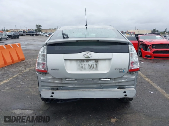 2006 Toyota Prius with VIN JTDKB20U567530398, listed as a IAAI auction lot 41803977 with 246,669 mi miles. Bid and sale history available at carsss.com. Image 16.