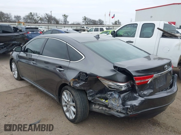 2015 Toyota Avalon Limited with VIN 4T1BK1EB4FU167011, listed as a IAAI auction lot 41582722 with 77,314 mi miles and . Bid and sale history available at DreamBid. Image 3.