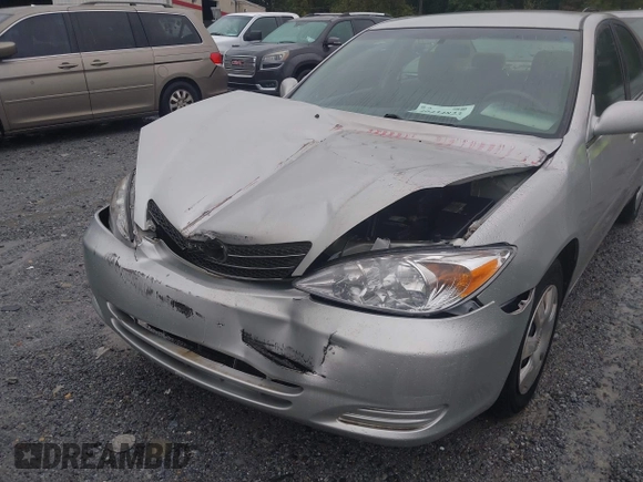 2004 Toyota Camry LE z VIN 4T1BE32KX4U842784, wystawiony jako IAAI lot #40434823 z przebiegiem 119 021 mil mil oraz . Historia ofert i sprzedaży dostępna na DreamBid. Obrazek 6.