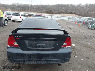 2003 Honda Civic EX with VIN 1HGEM229X3L002571, listed as a IAAI auction lot 41705549 with 134,689 mi miles. Bid and sale history available at carsss.com. Image 17.