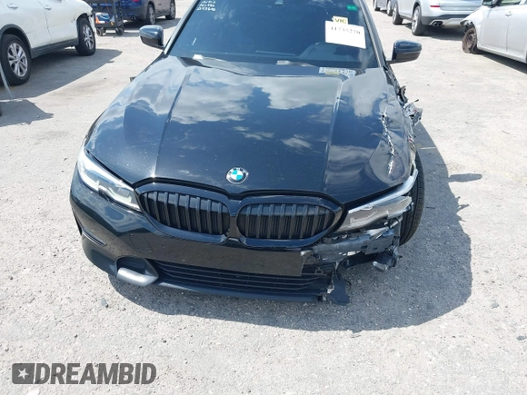 2021 BMW 3 Series 330i with VIN 3MW5R1J09M8B93600, listed as a IAAI auction lot 41735270 with 77,648 mi miles. Bid and sale history available at carsss.com. Image 6.