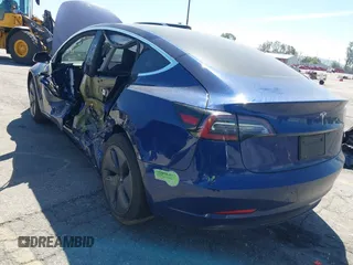 2020 Tesla Model 3 Standard Range Plus with VIN 5YJ3E1EA1LF590396, listed as a IAAI auction lot 41868089 with 51,278 mi miles. Bid and sale history available at carsss.com. Image 6.