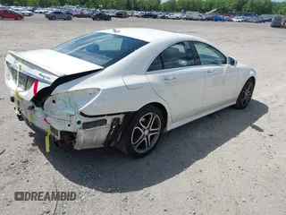 2015 Mercedes-Benz CLS 400 with VIN WDDLJ6HB9FA154511, listed as a IAAI auction lot 42155412 with 88,386 mi miles and . Bid and sale history available at DreamBid. Image 4.