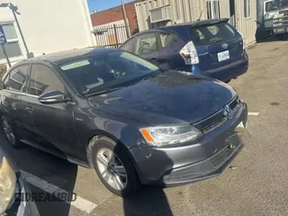 2013 Volkswagen Jetta Sedan Hybrid SE with VIN 3VW637AJ1DM296938, listed as a Copart auction lot 43277665 with 1 mi miles and Clean Title. Bid and sale history available at carsss.com. Image 1.