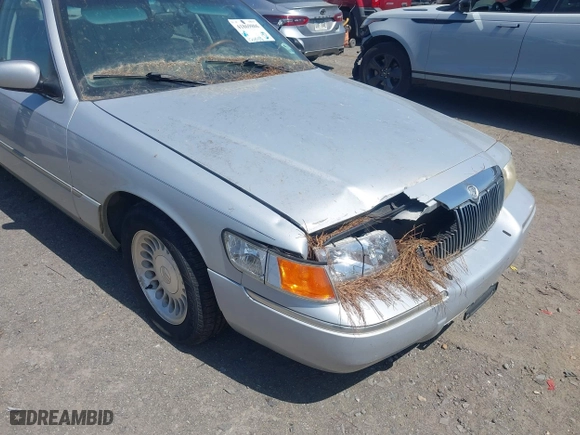 2002 Mercury Grand Marquis LS Premium with VIN 2MEFM75W02X660966, listed as a IAAI auction lot 41869806 with 133,758 mi miles. Bid and sale history available at carsss.com. Image 6.