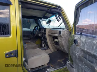 2007 Jeep Wrangler Unlimited Sahara with VIN 1J4GA59187L189519, listed as a IAAI auction lot 41204036 with 165,428 mi miles and . Bid and sale history available at DreamBid. Image 5.
