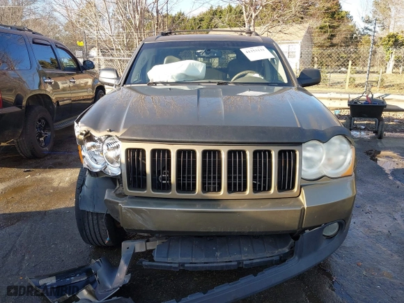 2009 Jeep Grand Cherokee Laredo with VIN 1J8GS48K79C516320, listed as a IAAI auction lot 41353131 with 166,739 mi miles. Bid and sale history available at carsss.com. Image 12.