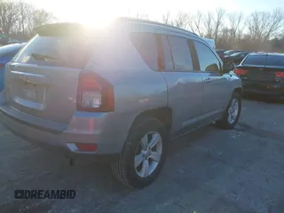 2016 Jeep Compass Sport with VIN 1C4NJCBA1GD743294, listed as a IAAI auction lot 41035177 with 124,379 mi miles. Bid and sale history available at carsss.com. Image 4.