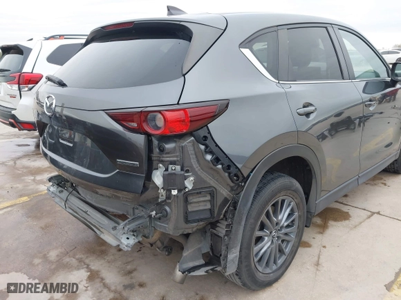 2021 Mazda CX-5 Touring with VIN JM3KFBCM0M0342210, listed as a IAAI auction lot 41236013 with 96,012 mi miles. Bid and sale history available at carsss.com. Image 6.