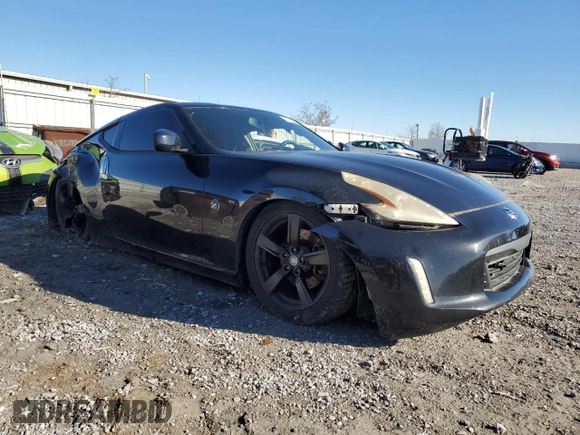 2014 Nissan 370Z Nismo with VIN JN1AZ4EH5EM632124, listed as a Copart auction lot 78720524 with Not Provided miles and Salvage Title. Bid and sale history available at DreamBid. Image 4.