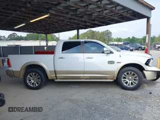 2014 Ram 1500 Longhorn z VIN 1C6RR6PT0ES129729, wystawiony jako IAAI lot #42018089 z przebiegiem 126 074 mil mil oraz . Historia ofert i sprzedaży dostępna na DreamBid. Obrazek 14.