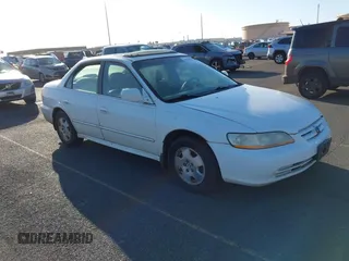 2002 Honda Accord EX z VIN 1HGCG16522A024557, wystawiony jako IAAI lot #41525344 z przebiegiem 219 786 mil mil oraz . Historia ofert i sprzedaży dostępna na DreamBid. Obrazek 1.