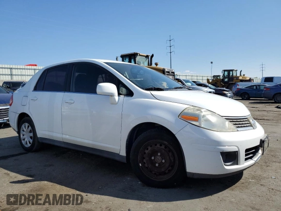 2009 Nissan Versa 1.8 S with VIN 3N1BC11E49L371066, listed as a Copart auction lot 57502474 with 157,127 mi miles and Salvage Title. Bid and sale history available at carsss.com. Image 4.