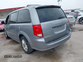2014 Dodge Grand Caravan SXT z VIN 2C4RDGCG7ER212419, wystawiony jako IAAI lot #42272015 z przebiegiem 175 801 mil mil oraz . Historia ofert i sprzedaży dostępna na DreamBid. Obrazek 3.