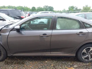 2021 Honda Civic LX с VIN 2HGFC2F6XMH556442, выставлен на аукционе IAAI как лот 42252316 с пробегом 25 375 миль миль и . История ставок и продаж доступна на DreamBid. Изображение 14.