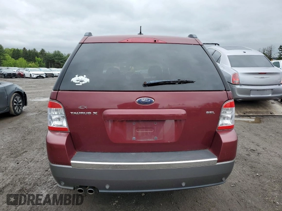 2008 Ford Taurus X SEL z VIN 1FMDK02W68GA43723, wystawiony jako Copart lot #56650305 z przebiegiem 279 439 mil mil oraz Czysty tytuł • Clean title. Historia ofert i sprzedaży dostępna na DreamBid. Obrazek 6.