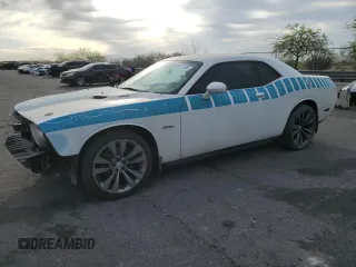 2014 Dodge Challenger R/T z VIN 2C3CDYBTXEH299494, wystawiony jako Copart lot #53518755 z przebiegiem 144 244 mil mil oraz Szkody całkowita. Historia ofert i sprzedaży dostępna na DreamBid. Obrazek 1.