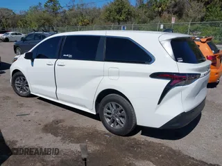 2023 Toyota Sienna LE with VIN 5TDKRKEC2PS173314, listed as a IAAI auction lot 41601728 with 50,873 mi miles. Bid and sale history available at carsss.com. Image 3.