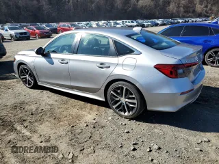2024 Honda Civic Sedan Touring with VIN 2HGFE1F95RH325566, listed as a Copart auction lot 51640455 with 7,127 mi miles and Salvage Title. Bid and sale history available at carsss.com. Image 2.