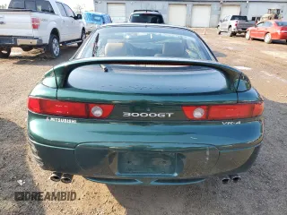 1998 Mitsubishi 3000GT VR-4 z VIN JA3AN74K5WY000630, wystawiony jako Copart lot #65715174 z przebiegiem 78 662 mil mil oraz Tytuł czysty. Historia ofert i sprzedaży dostępna na DreamBid. Obrazek 6.
