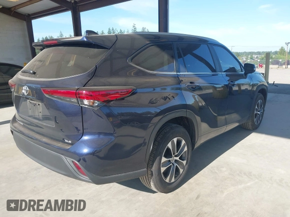2023 Toyota Highlander L with VIN 5TDKDRAH3PS526958, listed as a IAAI auction lot 42397325 with 10,430 mi miles and . Bid and sale history available at DreamBid. Image 4.