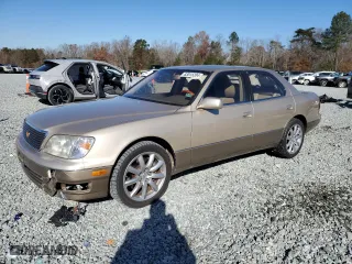 1999 Lexus LS 400 Luxury Sdn with VIN JT8BH28F8X0154051, listed as a Copart auction lot 83015204 with 196,727 mi miles and Salvage Title. Bid and sale history available at carsss.com. Image 1.