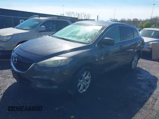 2013 Mazda CX-9 Sport with VIN JM3TB2BA3D0416842, listed as a IAAI auction lot 41874362 with 236,772 mi miles and . Bid and sale history available at carsss.com. Image 2.